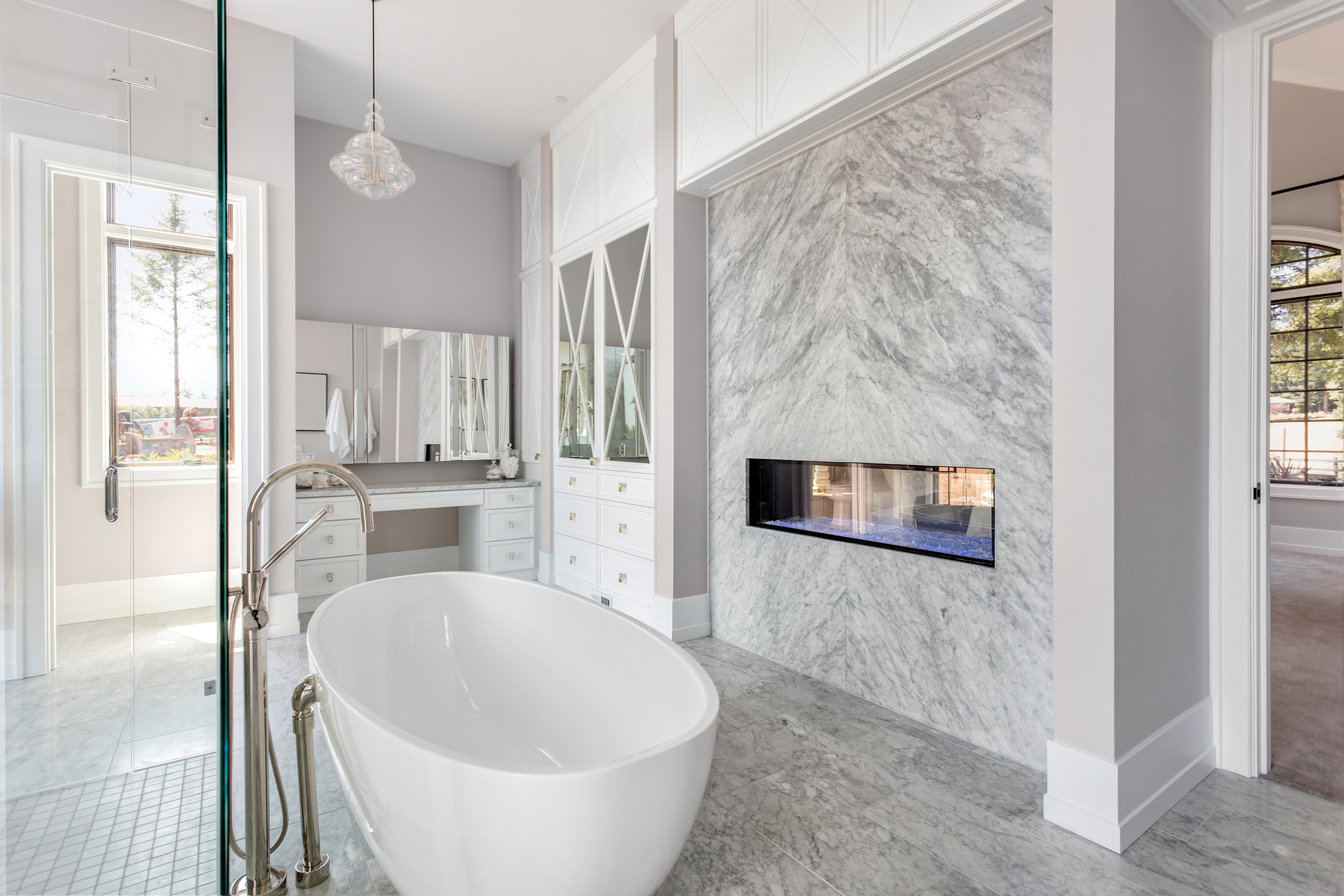 Elegant bathroom with fireplace and bathtub